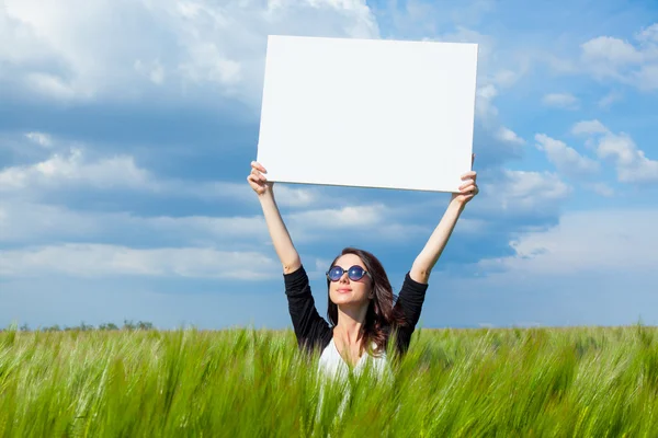 Mujer joven con cartel — Foto de Stock