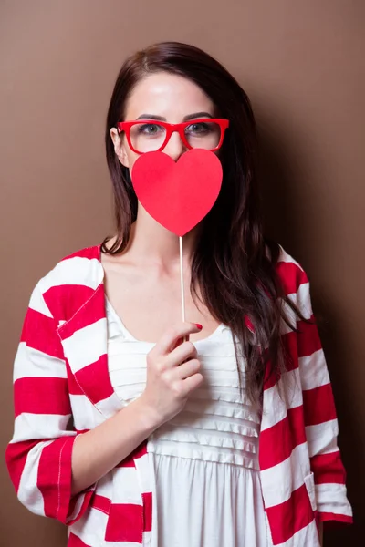 Jovem mulher com brinquedo — Fotografia de Stock