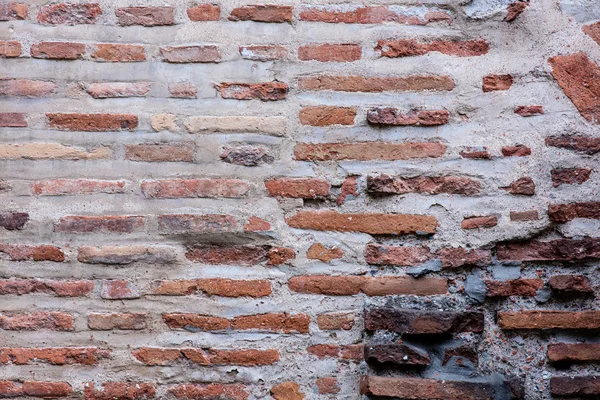 Oude bakstenen muur — Stockfoto