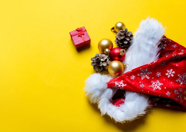Christmas decorations  on yellow background — Stock Photo, Image
