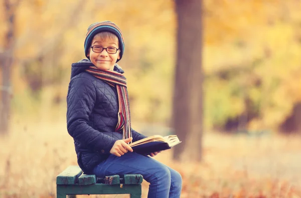 Boy with a big book — Stock Photo, Image