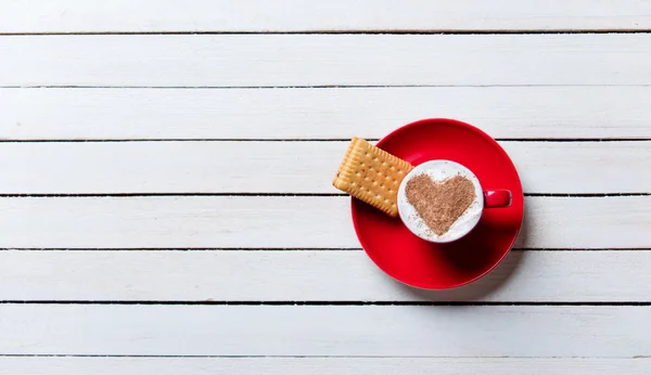 Cup of coffee and cookie — Stock Photo, Image