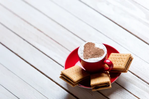 Xícara de café e biscoitos — Fotografia de Stock