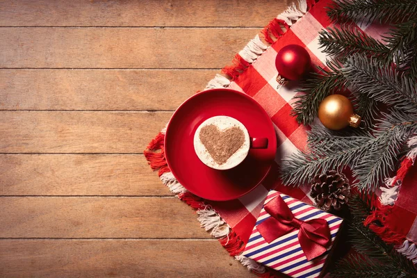 Cup of coffee and christmas decorations — Stock Photo, Image