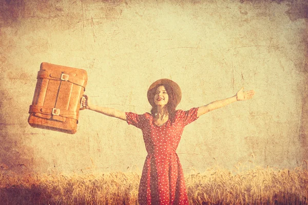 Молода жінка з валізою — стокове фото