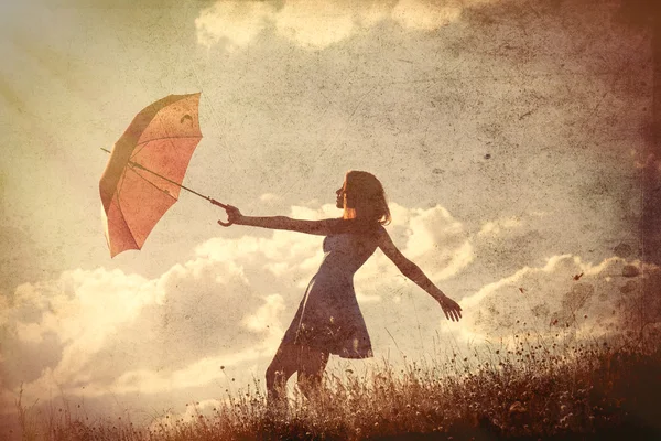 Fiatal nő esernyővel — Stock Fotó