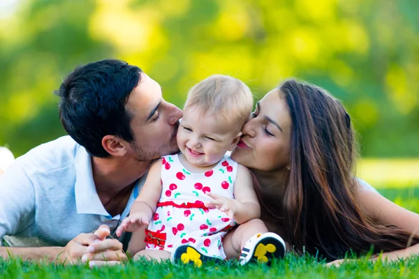 Gelukkig jonge familie foto Stockfoto