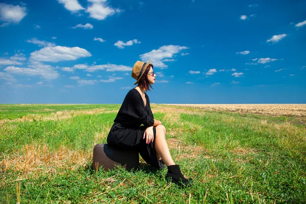 Young woman with suitcase — Stock Photo, Image