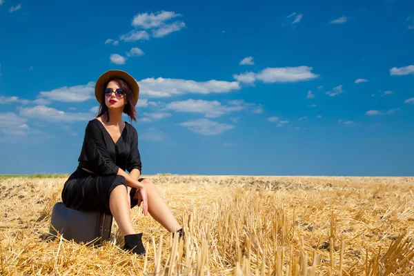 Young woman with suitcase — Stock Photo, Image