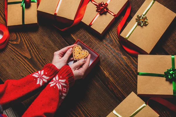 Female Hands Hold Cookie Gift Boxes Wooden Table — Stock Photo, Image