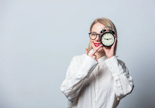 Portrait Beautiful Blonde White Shirt Alarm Clock White Background — Zdjęcie stockowe