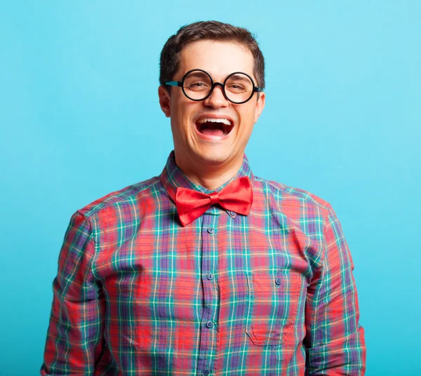 Funny nerd with glasses on blue background. — Stock Photo, Image