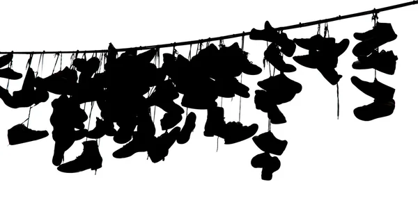 Shoes on rope, black and white — Stock Photo, Image