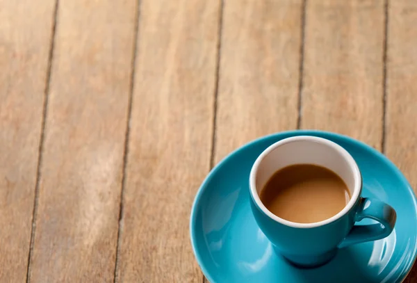 Color cup on a wooden table. — Stock Photo, Image