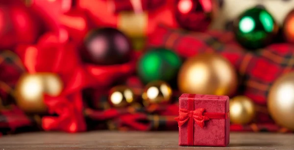 Gift box and christmas gifts on background. — Stock Photo, Image