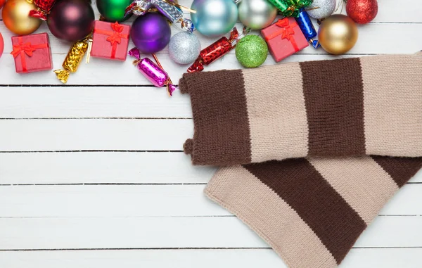 Scarf and christmas toys. — Stock Photo, Image