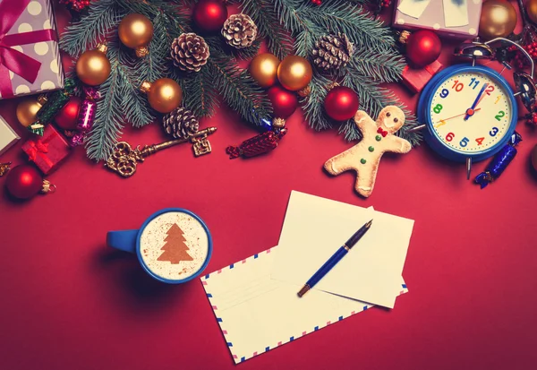 Cappuccino and letter with christmas gifts — Stock Photo, Image