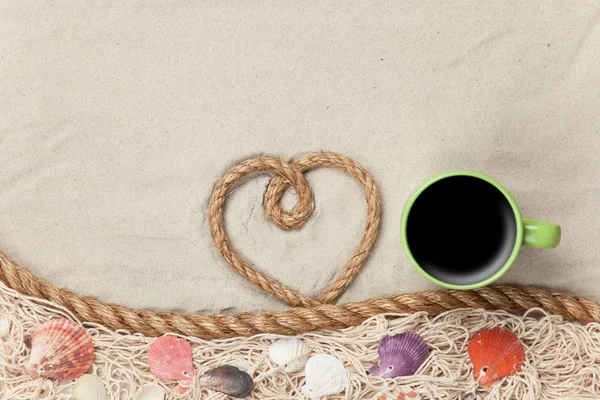 Hart vorm touw en kopje koffie — Stockfoto