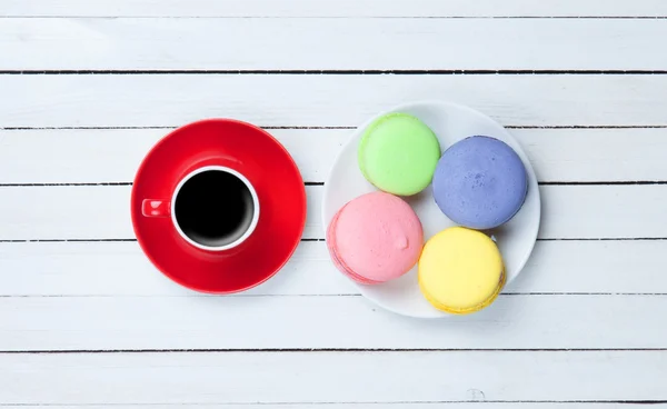 Cup of coffee and macarons — Stock Photo, Image