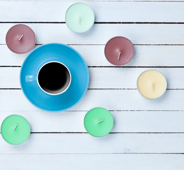 Cup of coffee and candles — Stock Photo, Image