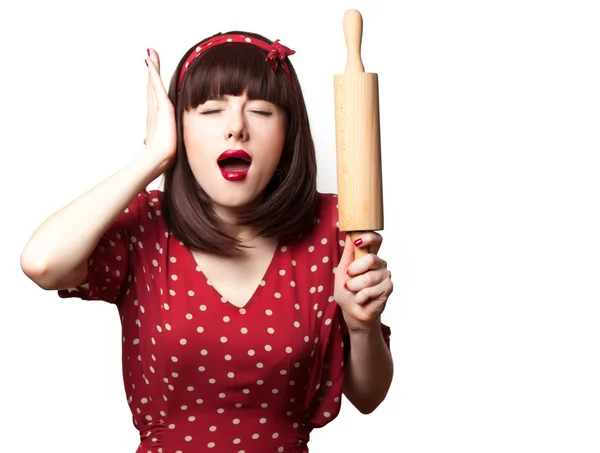 Housewife red dress with rolling pin — Stock Photo, Image