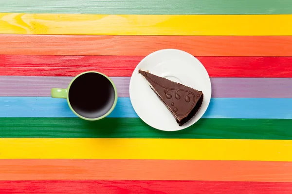 Cup of coffee and cake on a plate — Stock Photo, Image