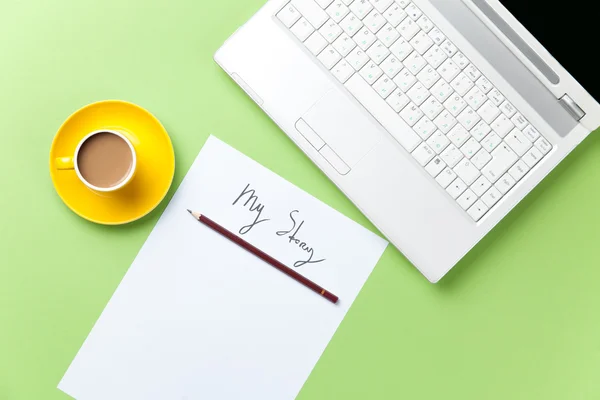 Cup of coffee and paper with inscription — Stock Photo, Image