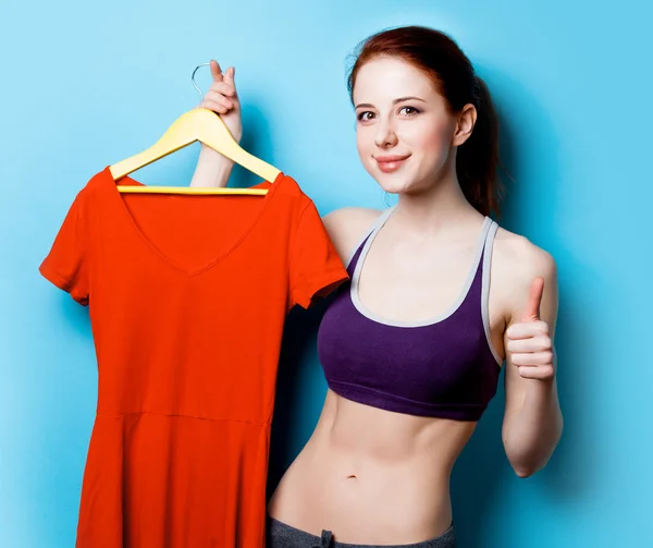 Woman showing her abs — Stock Photo, Image