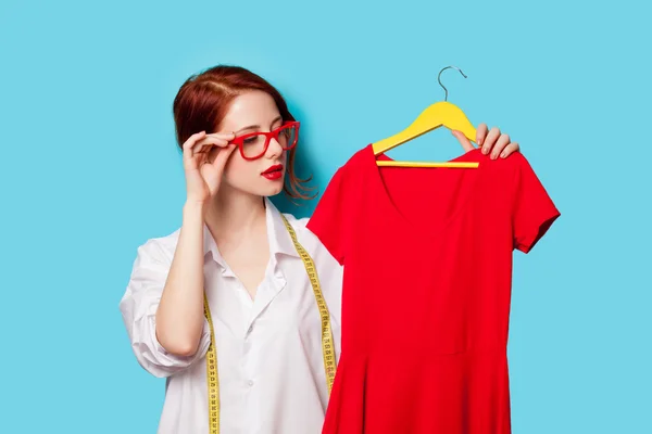 Designer with red dress — Stock Photo, Image