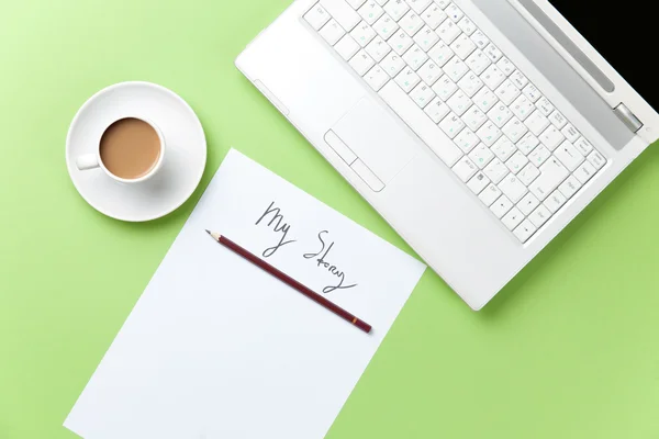 Cup of coffee and paper with inscription — Stock Photo, Image