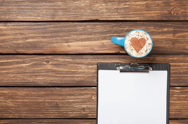 Cappuccino and business tablet — Stock Photo, Image