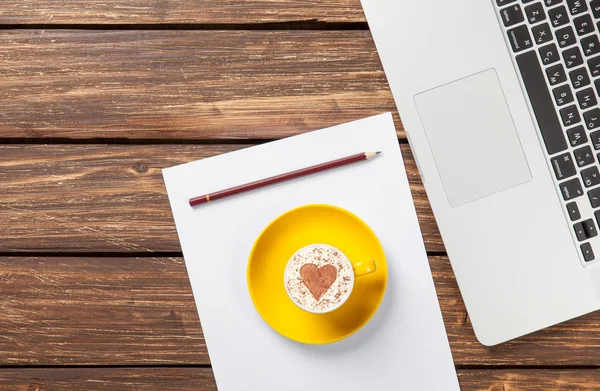 Cappuccino and paper with notebook — Stock Photo, Image