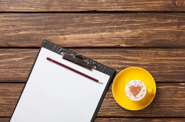 Cappuccino and business tablet — Stock Photo, Image