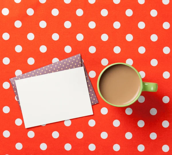 Cup of coffee and envelope — Stock Photo, Image