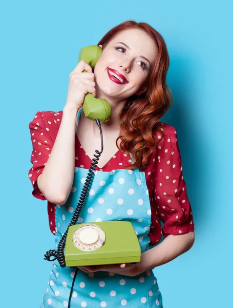 Girl in dress with green dial phone — Stock Photo, Image