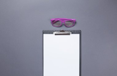 Glasses and business board
