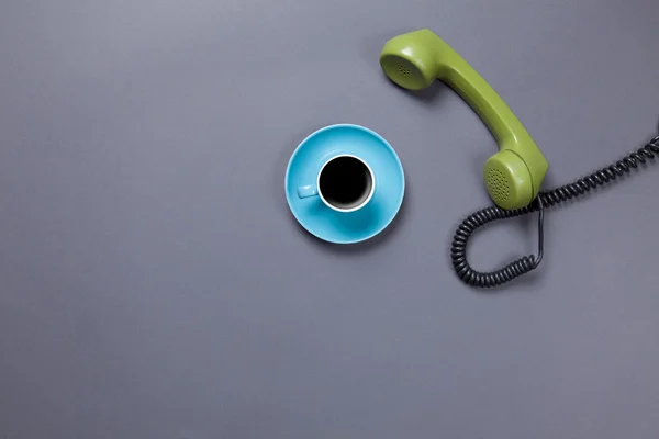 Coffee cup and retro dial phone — 스톡 사진