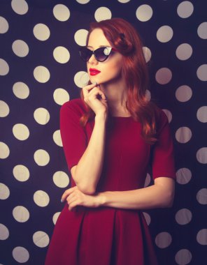 Beautiful redhead   woman in red dress
