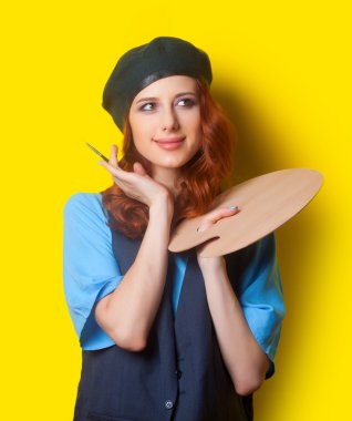 Woman with palette and brush