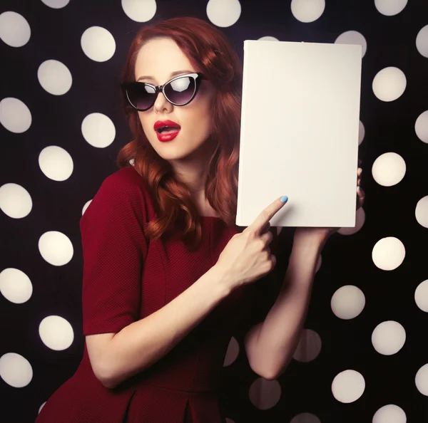 Portrait of a redhead   woman with white board — Stok fotoğraf