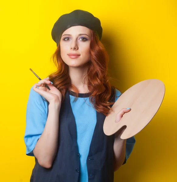 Mulher com paleta e escova — Fotografia de Stock