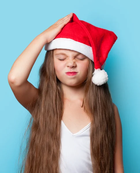 Joven chica triste en sombrero de Santas —  Fotos de Stock