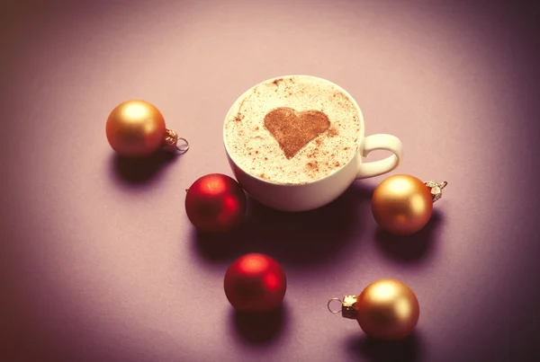 Coffee with heart shape and christmas bubbles — Stock Photo, Image