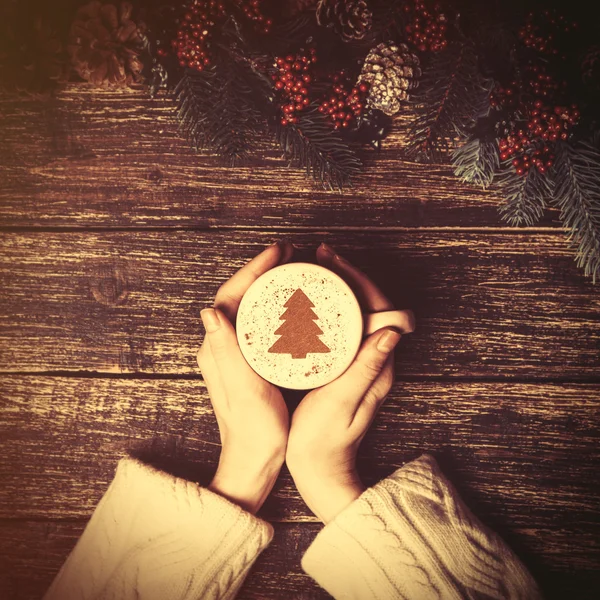 Female holding cup of coffee — Stock Photo, Image