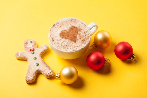 Coffee and gingerbread with christmas bubbles — Stock Photo, Image