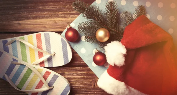 Santas hat and christmas bubbles — Stock Photo, Image