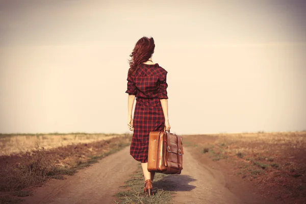 Girl in dress with bag — Stock Photo, Image