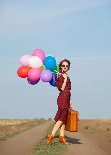 Chica con globos multicolores — Foto de Stock