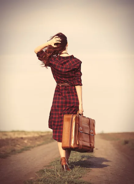 Chica en vestido con bolsa — Foto de Stock