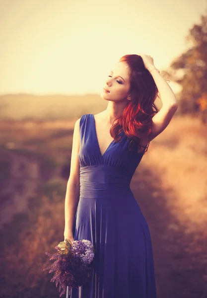 Menina bonita em vestido azul — Fotografia de Stock